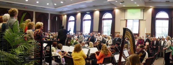 Pastor Harrup and the orchestra during a Sunday Morning 9:15am service.