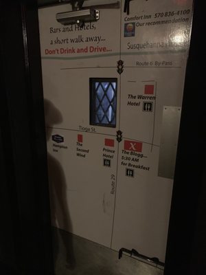 The inside of the exit door... a map that shows you were all the hotels are and reminds you not to drink and drive! Super smart!