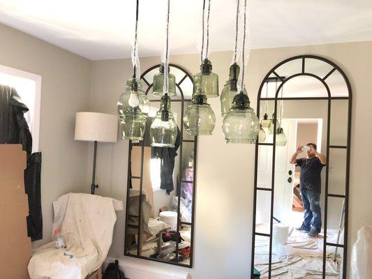 Dinning room: painted / replaced moldings /hung mirrors and lighting.