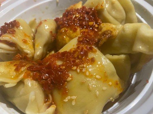 Szechuan wontons were not served like this,I added the hot oil.Still flavorless wontons 0/10