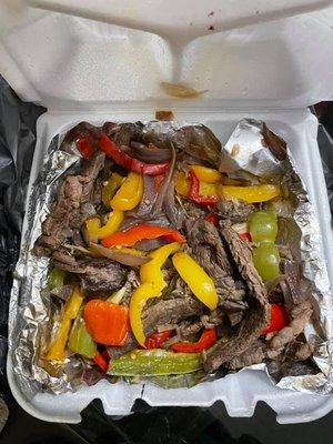 My fajitas. A lot came in the container, sure but not a speck of seasoning to be found and the steak is dry and chewy. So colorful, so awful