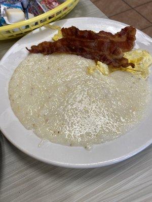 Eggs and platter that goes with French toast. Added a side of grits.