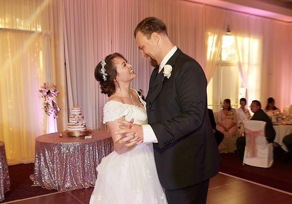 Beautiful drapery, cake table, and chair covers