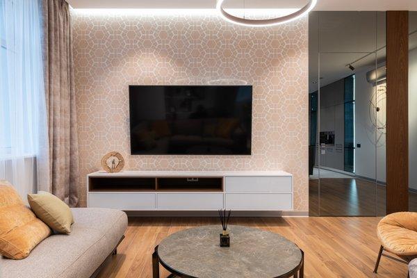 Transform your living room with our floating TV mounting service. No wires, no clutter, just pure modern elegance. Contact us today!