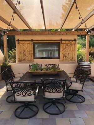 Outdoor TV stand with the barn doors