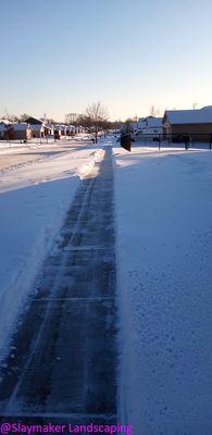 Here is a long sidewalk we Provide Snow Services in Cedar Rapids Iowa for!