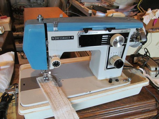 A vintage dressmaker style post WWII Japanese machine with all of the amenities. .