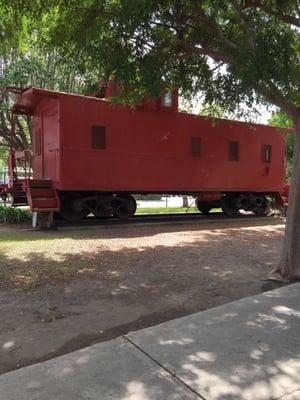 A train car next to the portable preschool classrooms