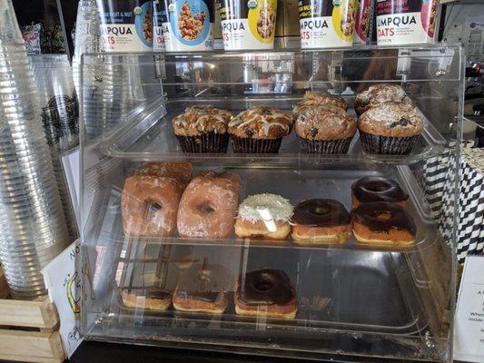 Cappuccino with Chocolate Chip muffins, Blueberry + Banana muffins, and Carlson's Donuts.