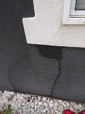 Two of many cracks on exterior wall