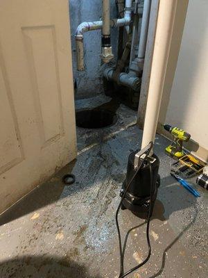 Installing new emergency basement pump