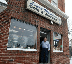 R. Craig Bittner at the door of Laurel Mountain Coin and Jewelry.