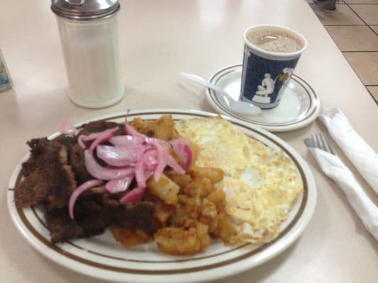 Steak eggs & home fries w/ a cup of cafe