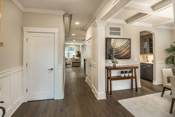 Stunning foyer leading to formal dining room.