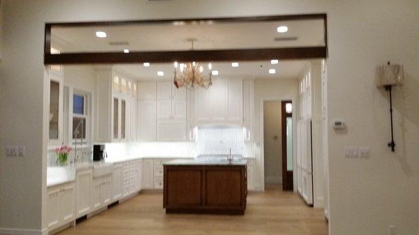 Large custom cabinetry, marble countertops.  WHite oak hardwood flooring.