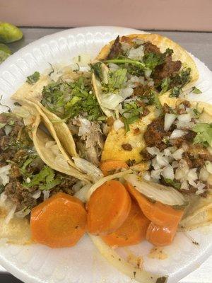 Pastor, azada and carnitas tacos.