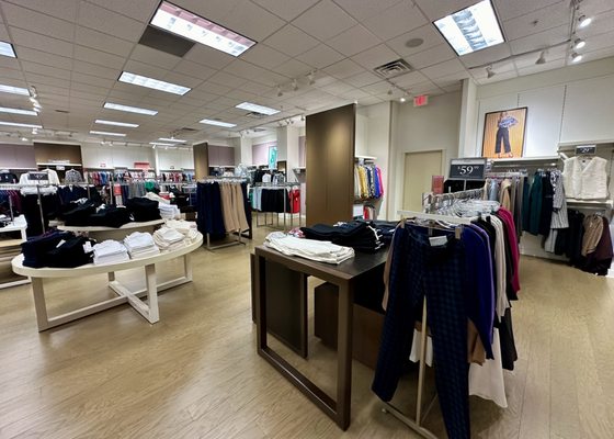 Racks and shelves of clothing