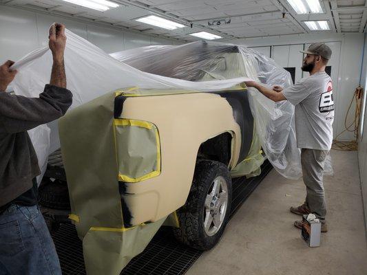 Wrapping truck in our down-draft paint booth.