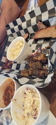 Burnt ends and brisket. Cole slaw, baked beans, and bacon mac 'n cheese. Sorry it's half eaten. Forgot to take the picture earlier.