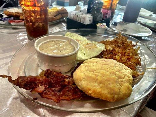 Small Breakfast: 2 Eggs, Bacon, Hashbrowns and Biscuit and gravy. Gravy tastes like it's from a package mix but still really good.