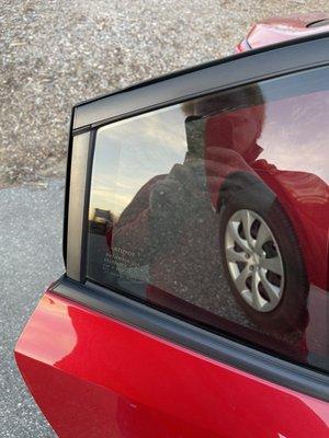 Second tint job attempted. I pointed this out as soon as I saw it and he assured me it would be fine.