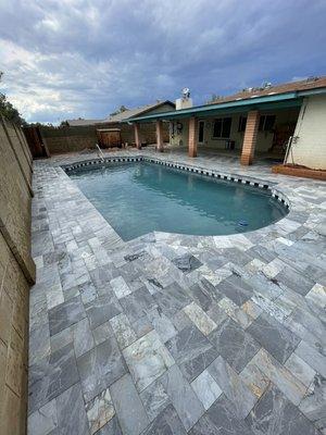 Pool Remodel, with beautiful marble paver and mini pebble interior!