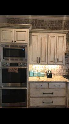 Distressed cabinets.