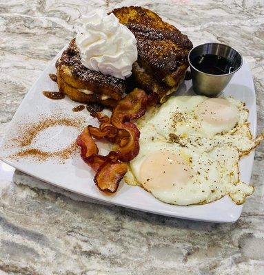 Cinnamon French toast 2 eggs and bacon served with REAL maple syrup!!