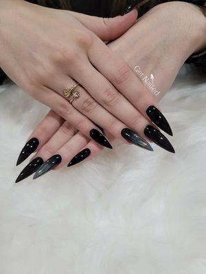 Black chrome stiletto nails