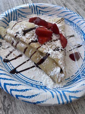 Nutella Crepe with strawberry and light chocolate drizzle.