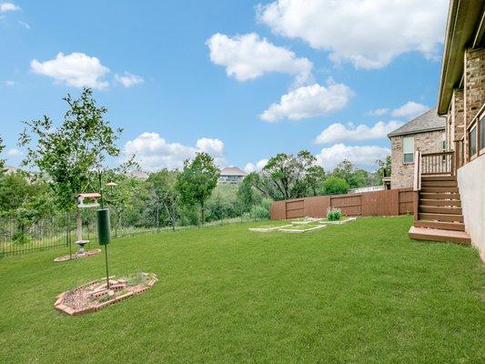 Come Tour 1078 Boulder Run New Braunfels TX Greenbelt and single story with gas cooking and custom cabinets with pull out, deep pan drawers