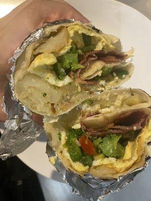 Turkey bacon breakfast burrito with veggies