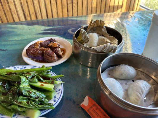 Stuffed eggplant, Chinese broccoli with oyster sauce, lotus wrapped sticky rice and shrimp and chive dumplings