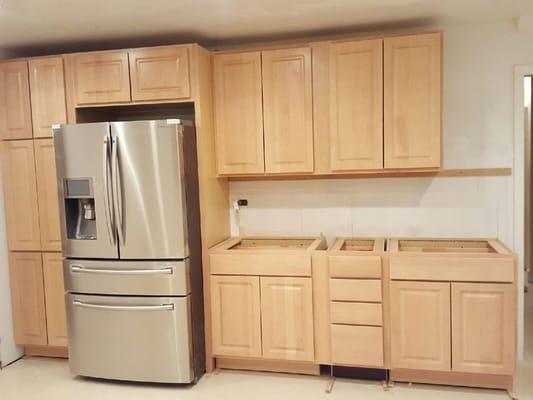 New cabinets installed, and ready for new counter tops and tiles.