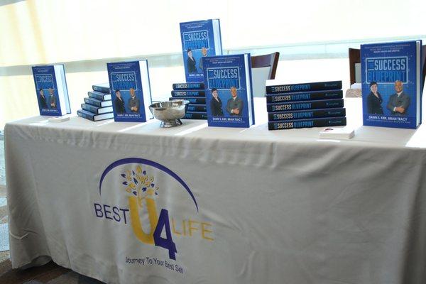 Selling copies of my book at NAWOSB Leadership Summit