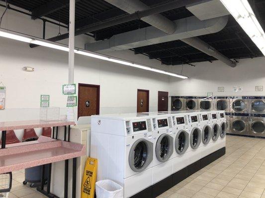 Front load washers, these are $3.5 each use. Dryers against the wall in the back.