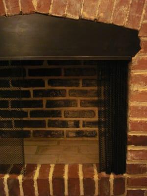 A custom smoke guard made by B&H Chimneys.