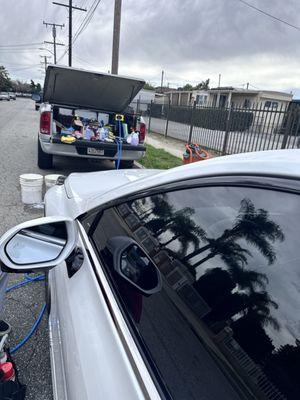 Mobile truck set up in front of a clients vehicle where we store all of our equipment!