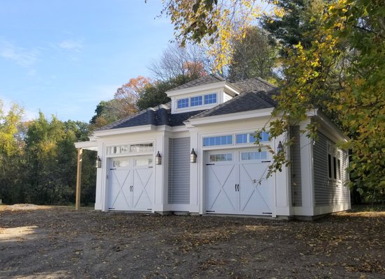 A nearly complete Georgian carriage house that compliments the main house.