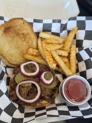 Our brisket is slow-cooked, chopped, and served on a grilled brioche bun, Delish!!