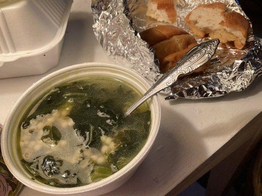 Wedding soup and garlic bread.