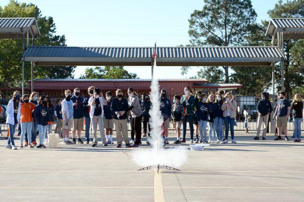 Middle school students launching their rockets