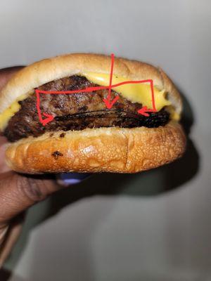 Metal cooked into the burger