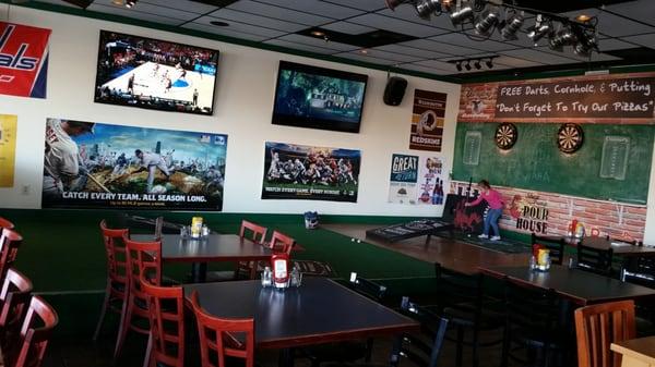 TVs,  cornhole,  darts,  mini golf,  beer,  and fun.  All the football games and all the sports you want. Awesome place to drink