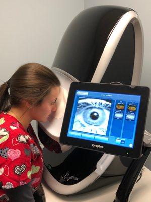 Our Optomap machine is also used as part of our standard of care and takes pictures of the Optic Nerve and Macula.