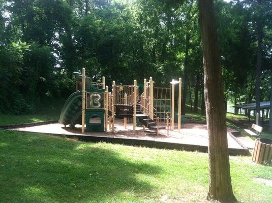 Playground with a littler set for the wee ones, behind this big kid one