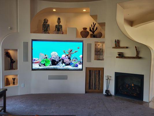 Curved Wall for TV, FIreplace, and Lighted Niches