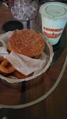 Double cheeseburger, onion rings and the wrong flavor milkshake.