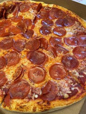 Medium pepperoni pizza was the perfect amount for 2-3 people. It was loaded with pepperoni sliced and just greasy enough