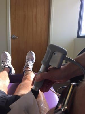 Shockwave Therapy working on my sore quads